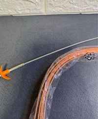 Herramienta flexible de dragado de tubos