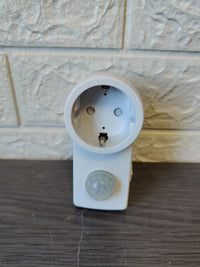 Enchufe con detector de movimiento
