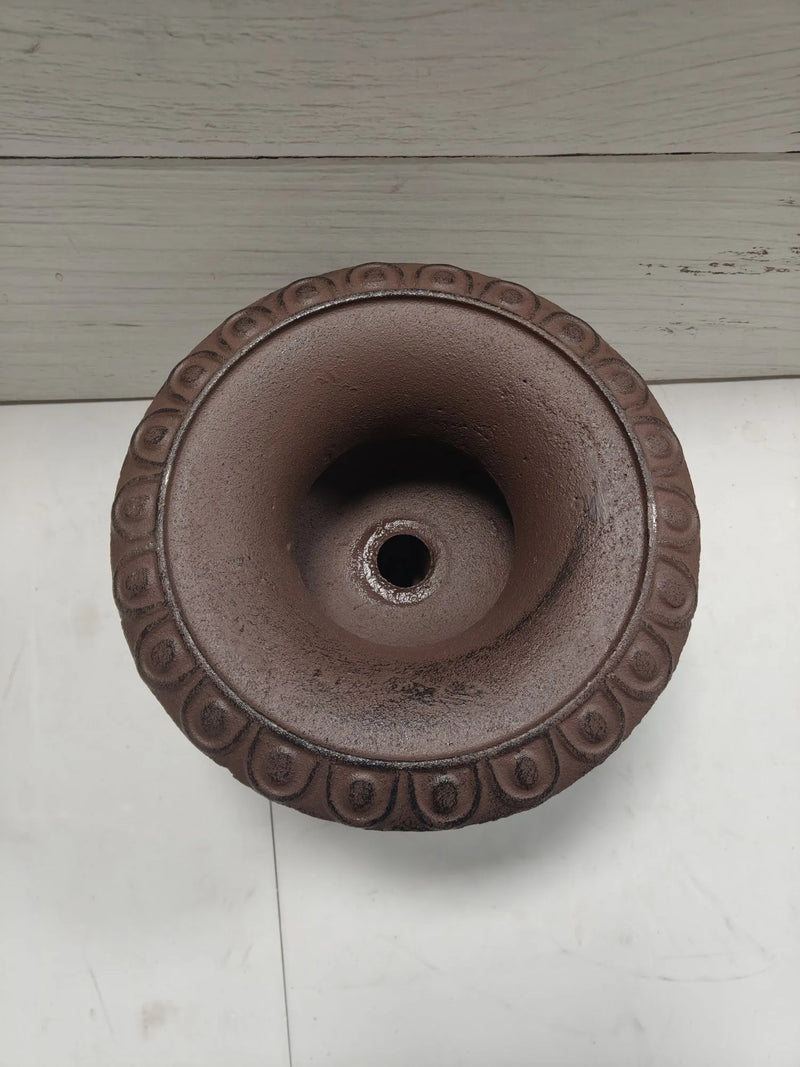 Maceta de diseño de hierro