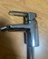 Grifo de bidé con vaciador automático