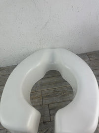 Asiento elevador inodoro