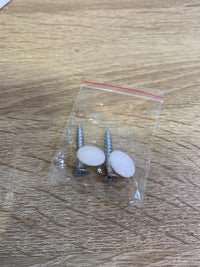 Tapa protectora para pasador de correa de persiana