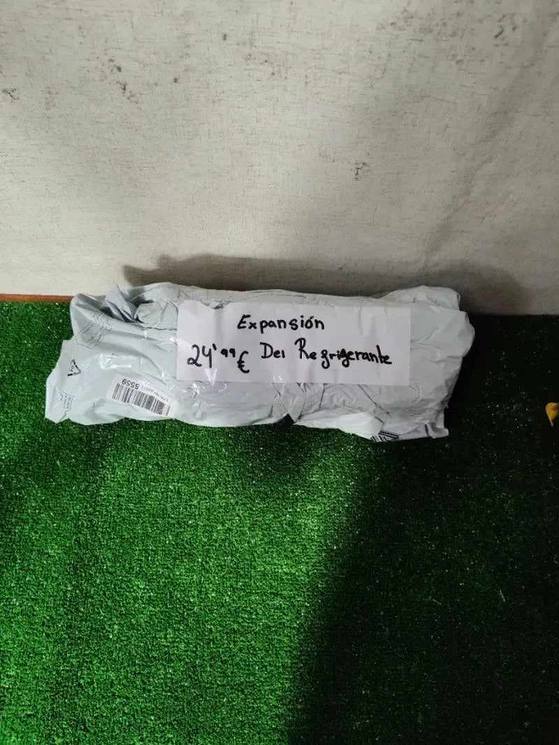Depósito de expansión de refrigerante