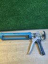 Pistola para sellado de calafateo Amazon Basics