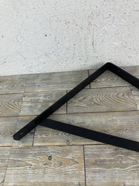 Escuadra para estantería de pared