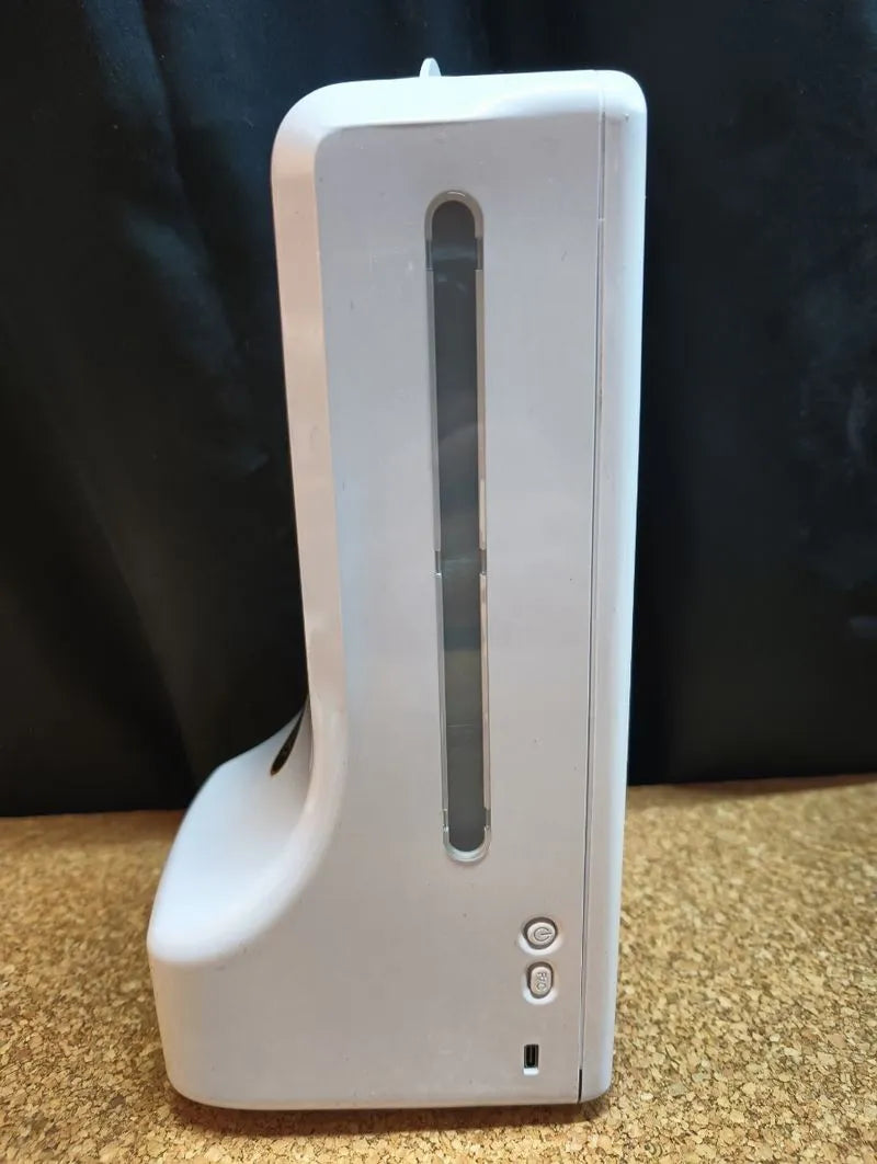 Termómetro de pared con dispensador