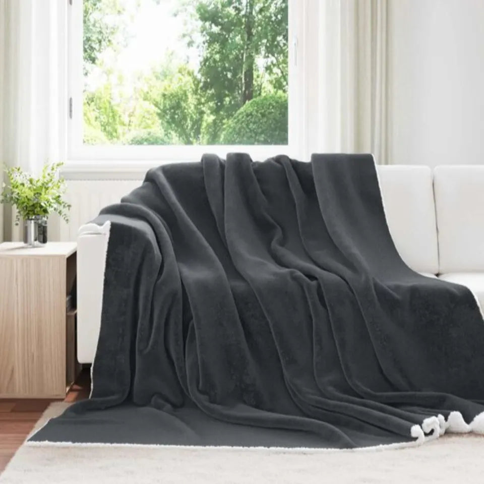 Manta reversible gris oscuro con lana