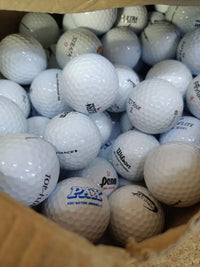 Caja pelotas de golf variadas