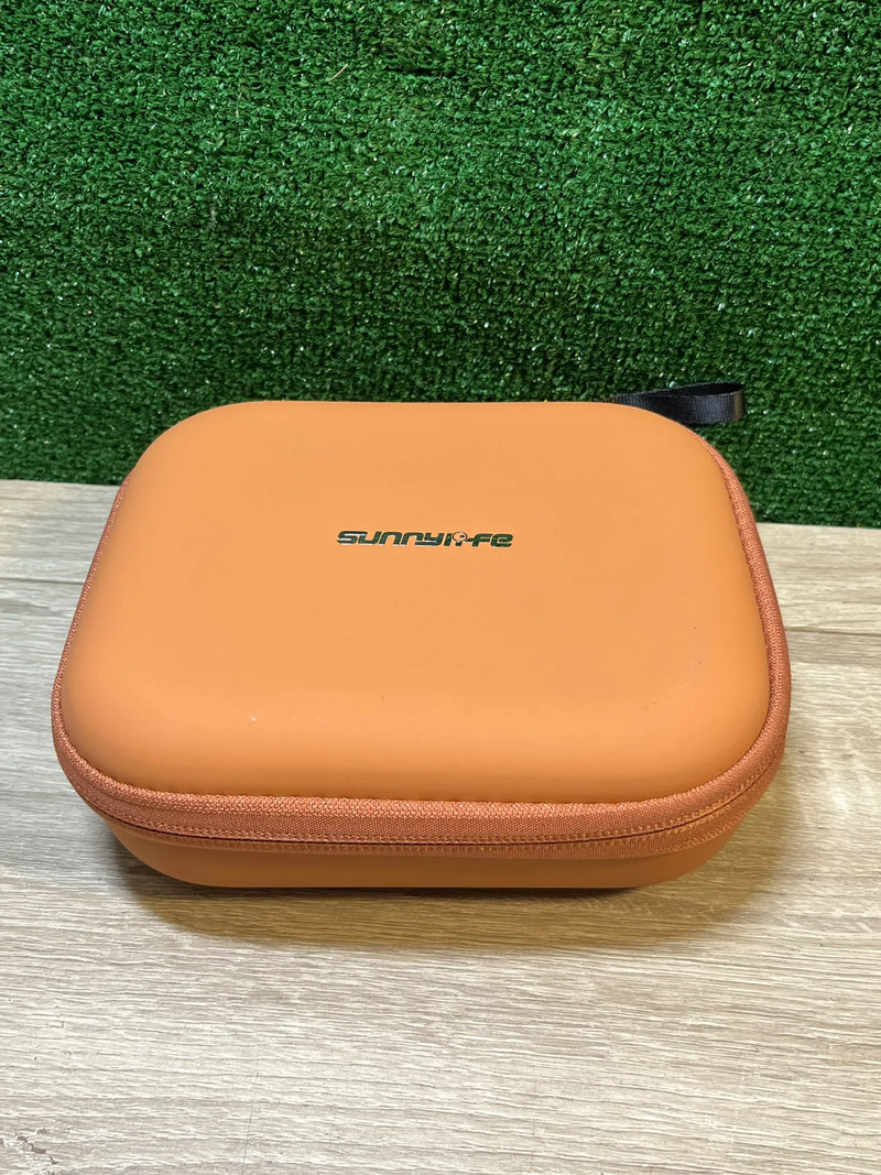 Funda rígida de transporte para mando a distancia