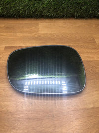 Espejo retrovisor coche sin cubierta