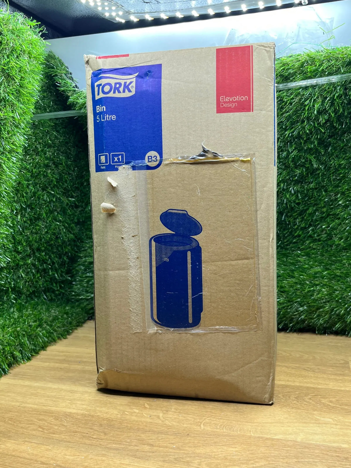 Cubo de basura con tapa Tork