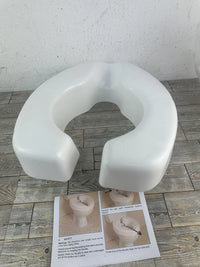 Asiento elevador inodoro