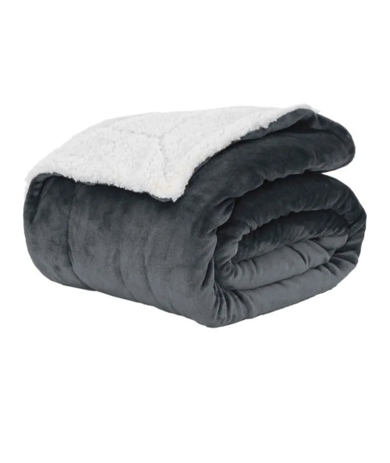 Manta reversible gris oscuro con lana
