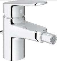 Grifo de bidé con vaciador automático