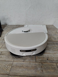 Aspirador con base - iRobot