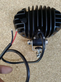 Faro de trabajo O1200 - 12V / 24V Hella Valuefit