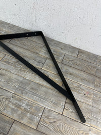 Escuadra para estantería de pared