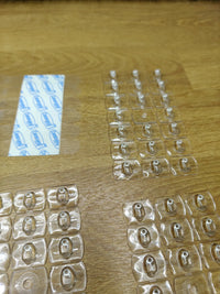 Ganchos pequeños alambres transparentes