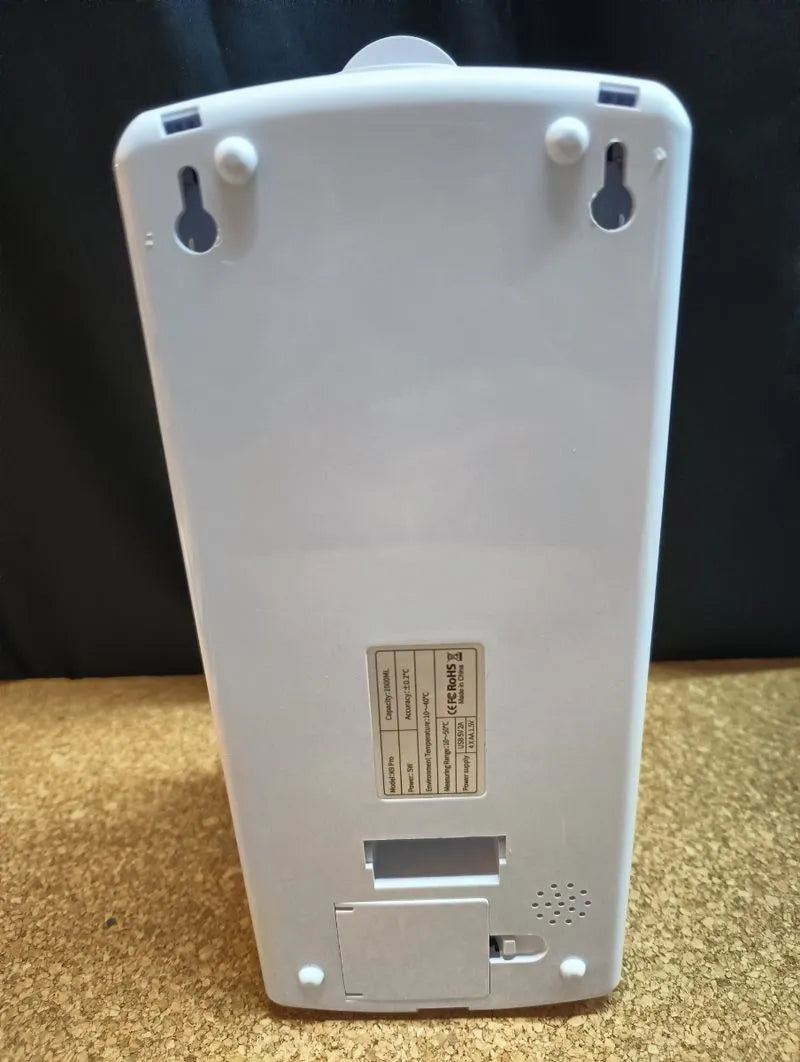 Termómetro de pared con dispensador