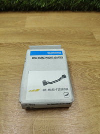 Adaptador freno de disco Shimano