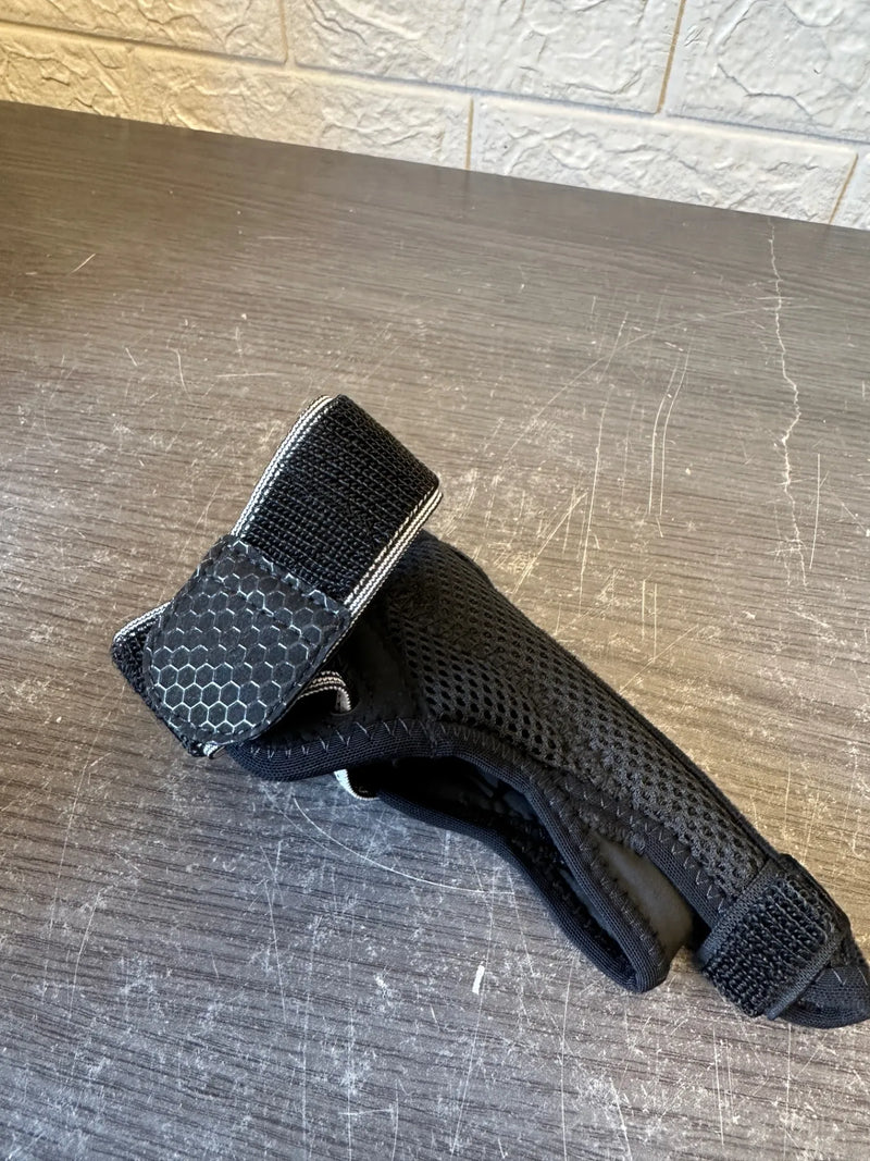 Muñequera para pulgar