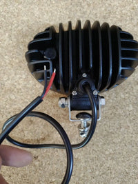 Faro de trabajo O1200 - 12V / 24V Hella Valuefit
