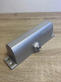 Cierrapuertas Brazo Articulado Tesa Assa Abloy