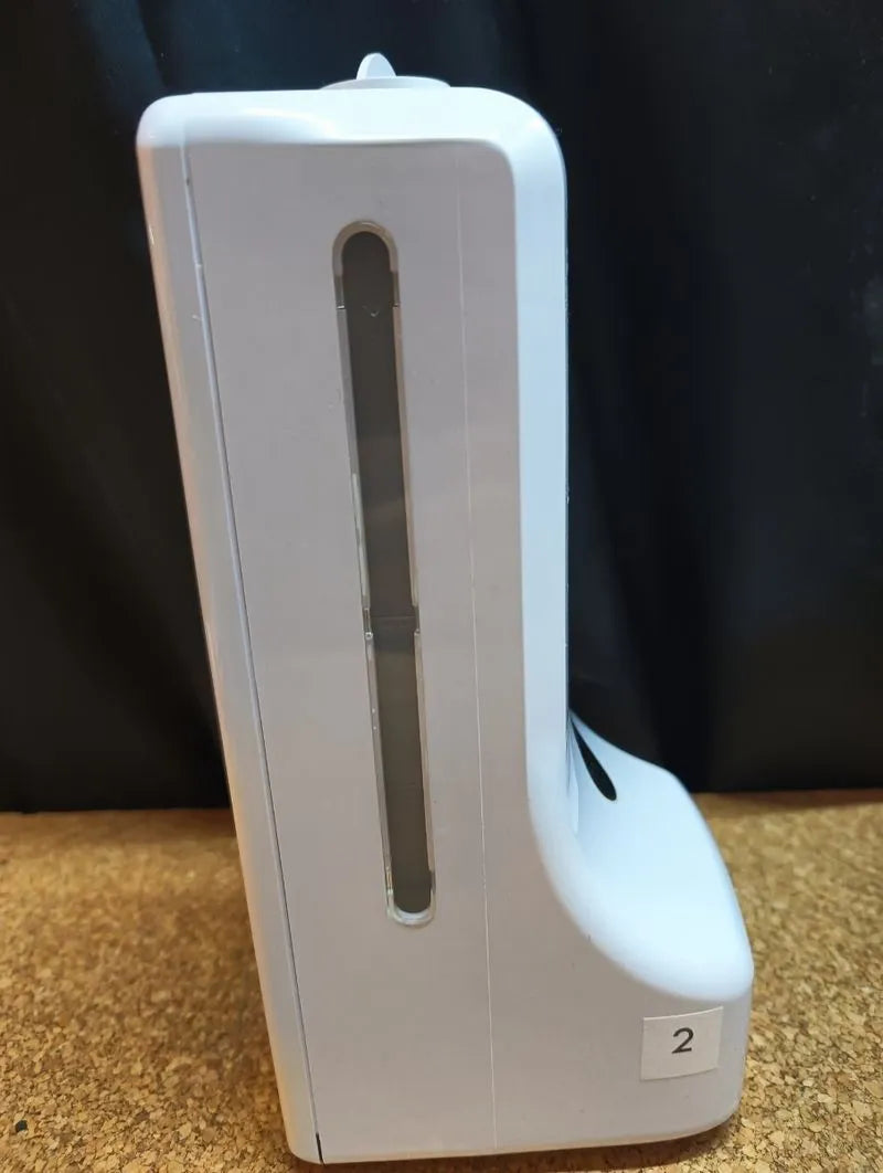 Termómetro de pared con dispensador