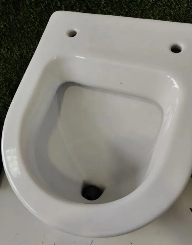 Entrada trasera con tapa - Urinal Roca Nexo