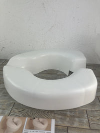 Asiento elevador inodoro
