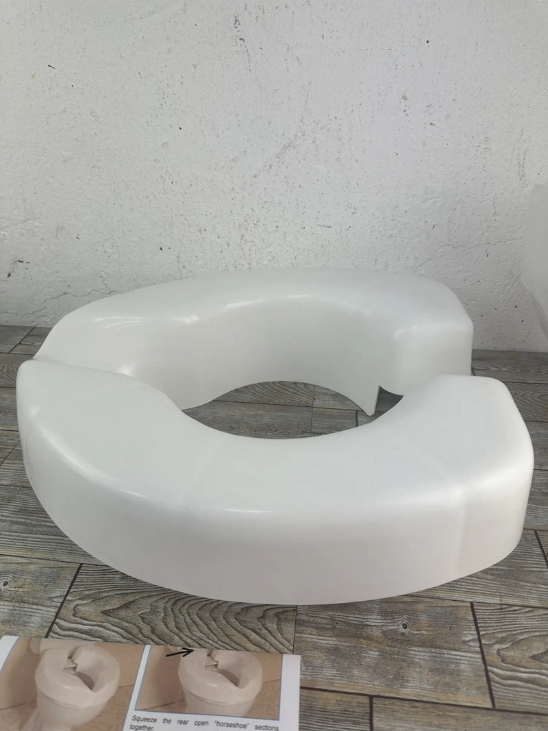 Asiento elevador inodoro