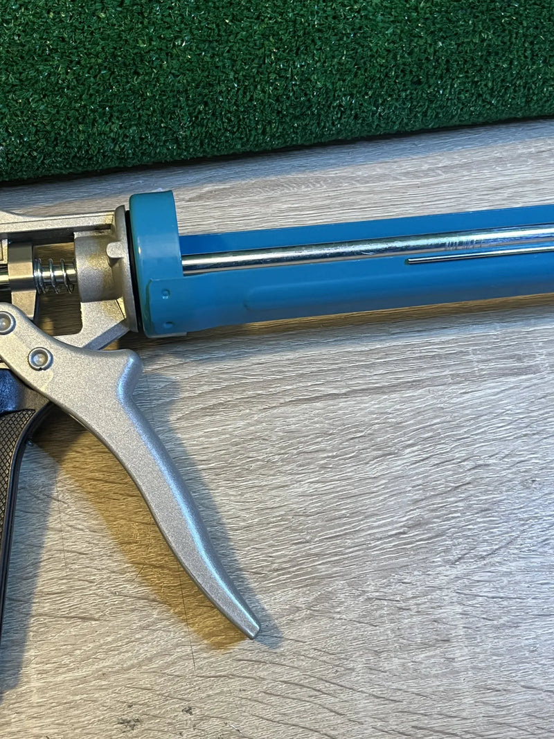 Pistola para sellado de calafateo Amazon Basics
