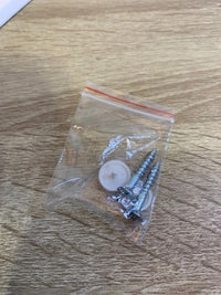 Tapa protectora para pasador de correa de persiana
