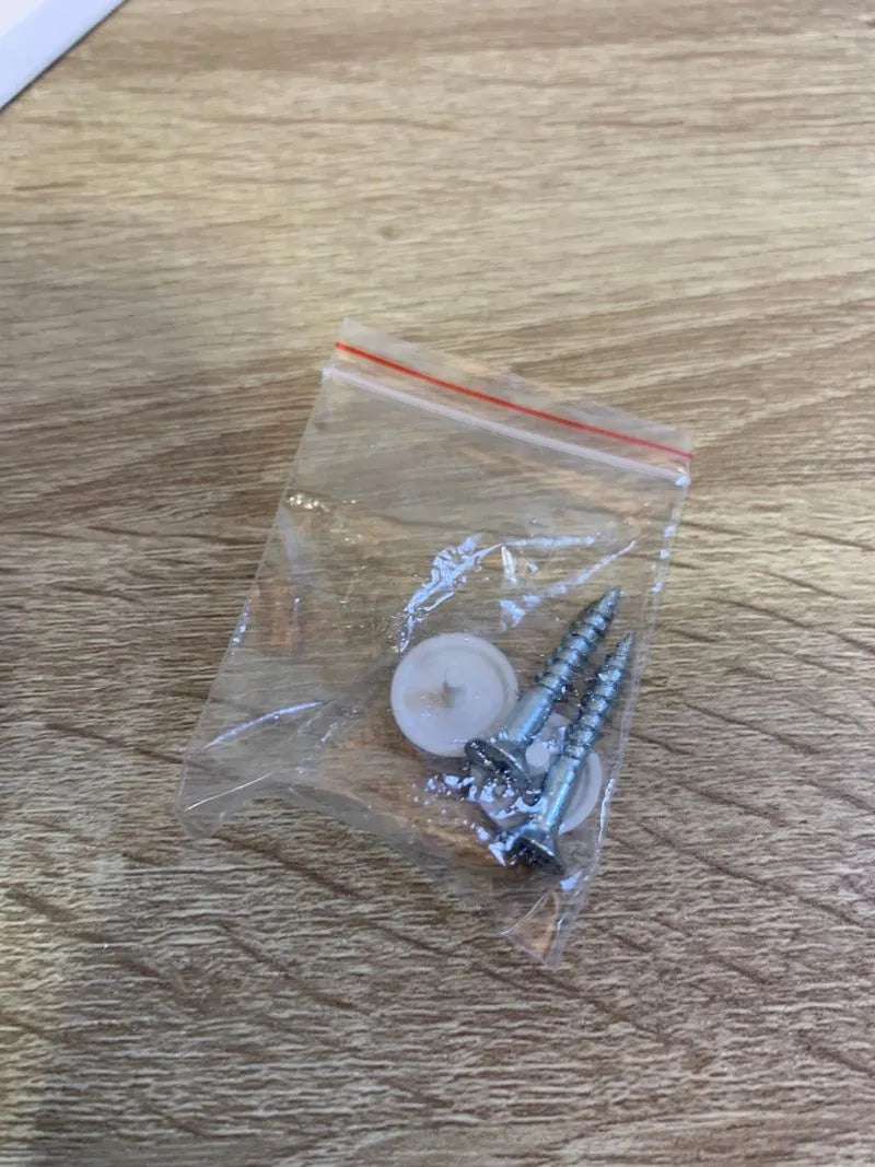 Tapa protectora para pasador de correa de persiana