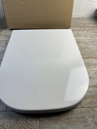 Tapa y asiento de baño Roca