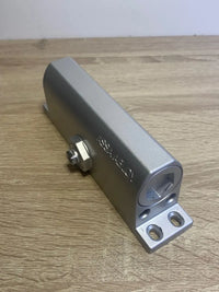 Cierrapuertas Brazo Articulado Tesa Assa Abloy