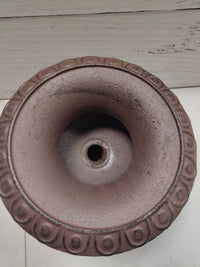 Maceta de diseño de hierro