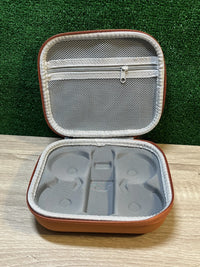 Funda rígida de transporte para mando a distancia