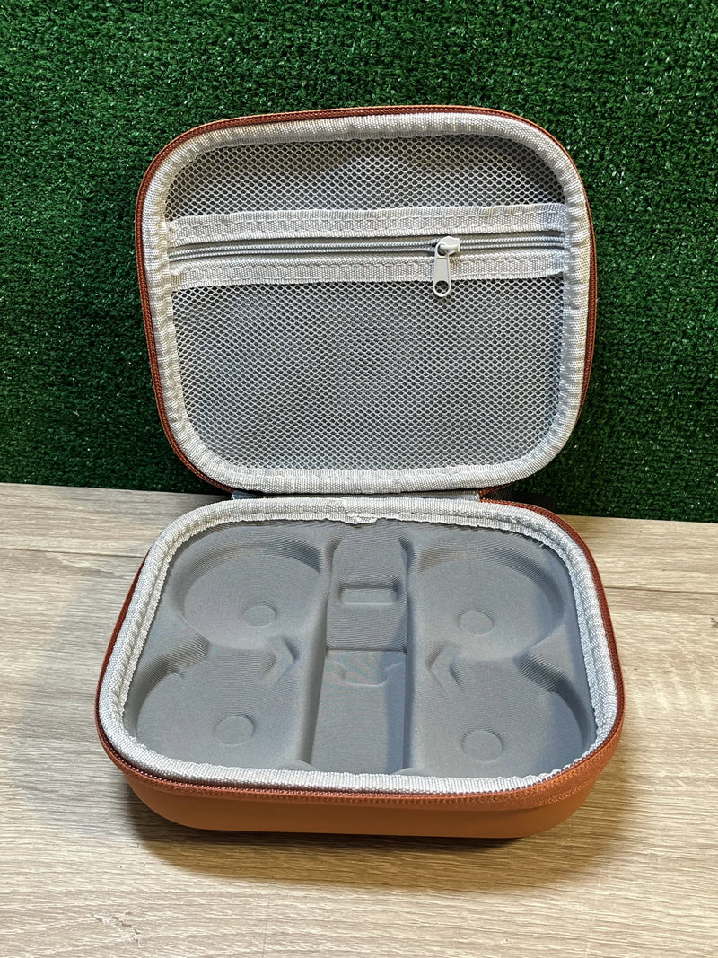 Funda rígida de transporte para mando a distancia