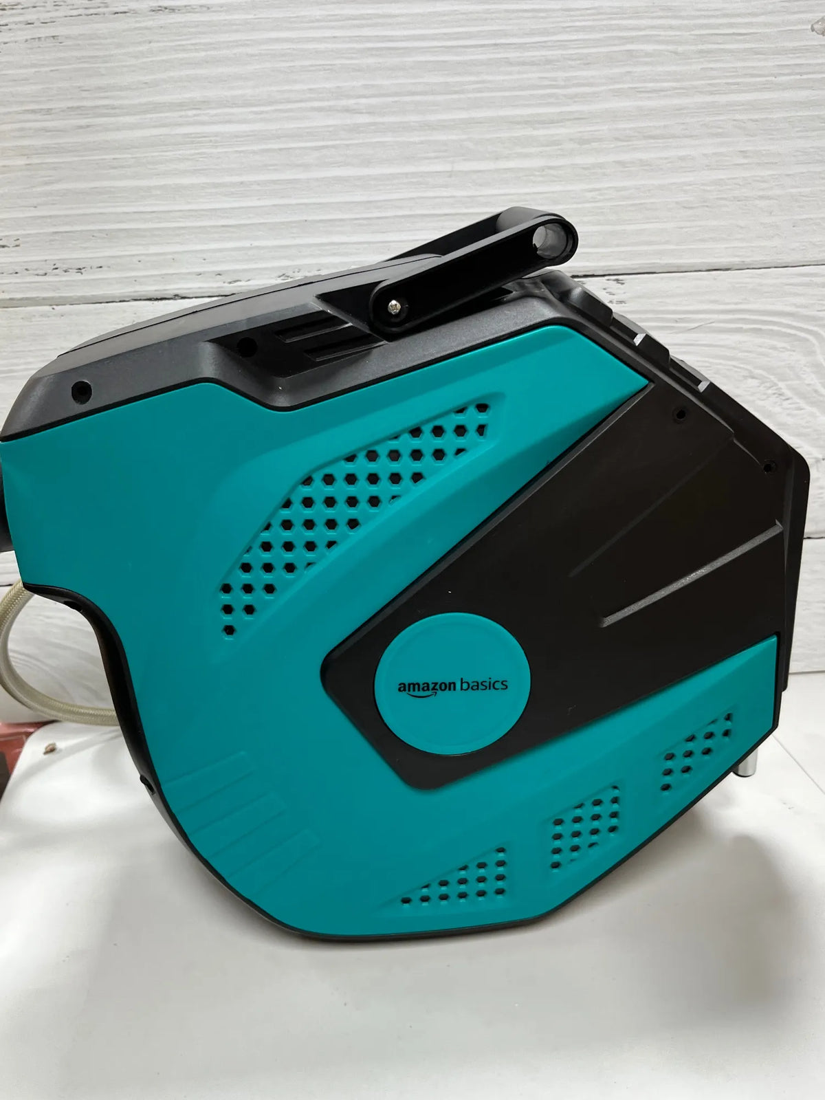 Enrollador automático de manguera 15 m Amazon Basics