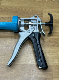 Pistola para sellado de calafateo 310ml Amazon Basics